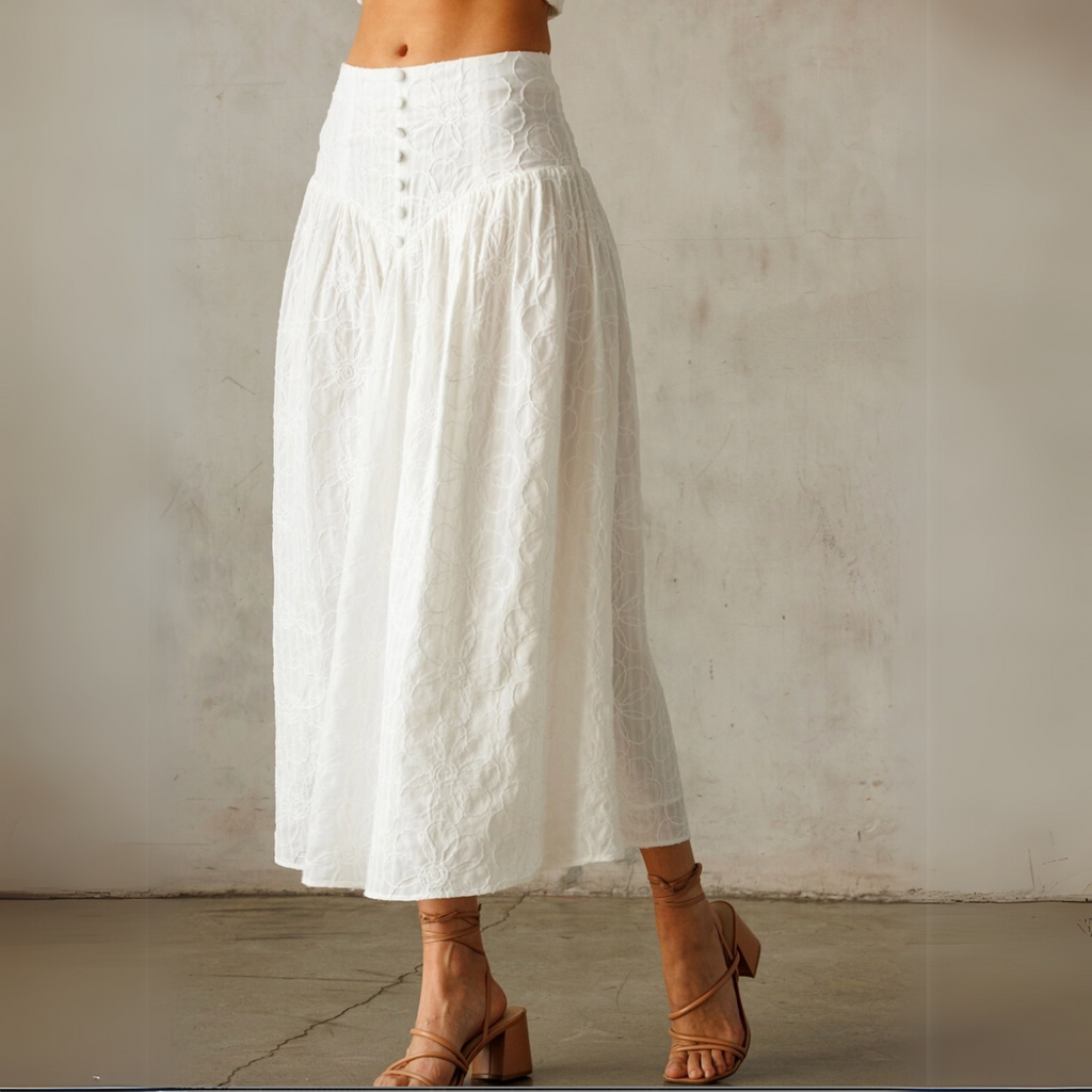 White midi skirt on model.