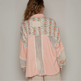 Back view of the vintage patchwork mesh jacket, showcasing lace details, floral accents, and breathable mesh paneling.