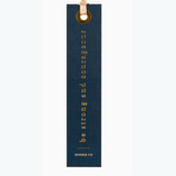 "Navy bookmark with gold foil scripture 'Be strong and courageous' - Joshua 1:9."