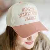 Close-up of the "Revival Starts With Family" hat being worn, showcasing the detailed embroidery and soft cotton fabric.