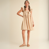 Front view of En Merci MDR3584 caramel and white striped midi dress on mannequin. Women's boutique fashion.