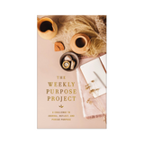 Flat lay photo of The Weekly Purpose Project journal with coffee and dried florals


