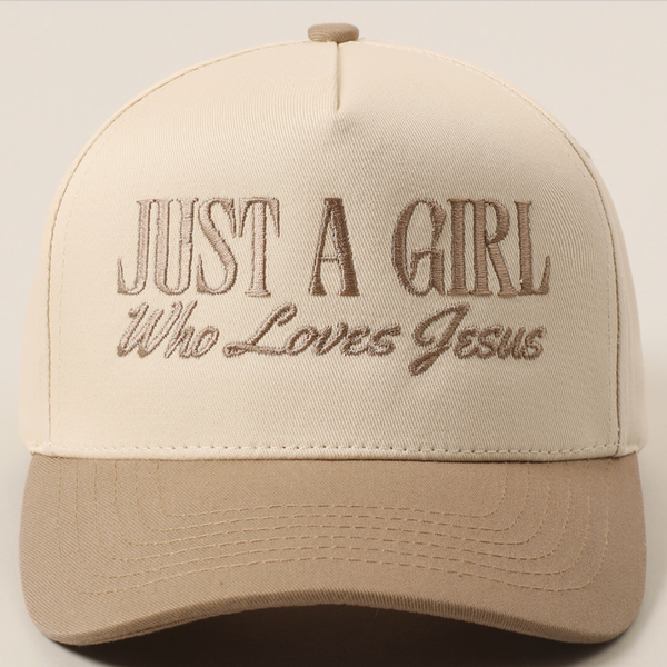 Beige and tan embroidered "Just A Girl Who Loves Jesus" trucker hat front view.
