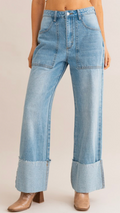 Front view of High Waist Wide Leg Cuffed Jeans styled with brown boots
