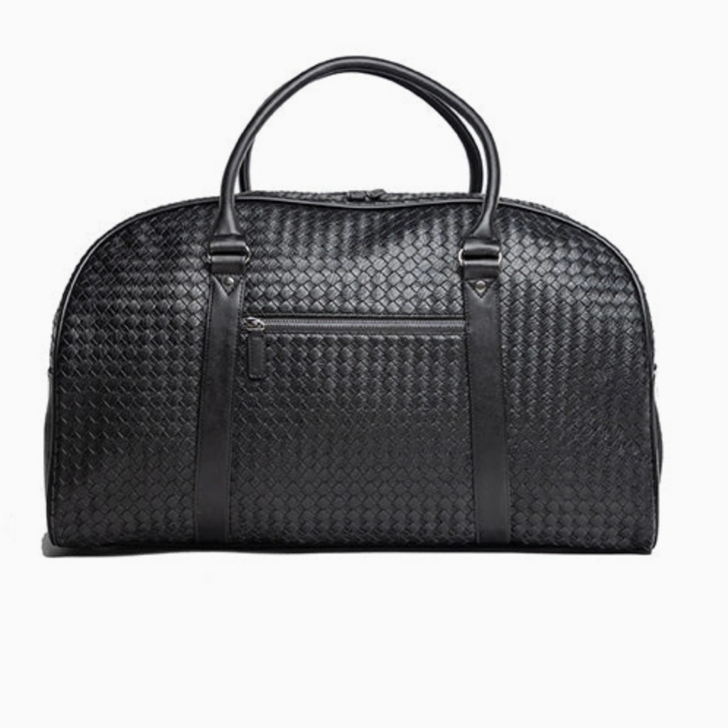 Black woven leather weekender duffel bag with top handles, front zipper pocket—ideal for travel and gym use.