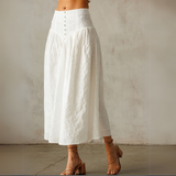 White midi skirt on model.

