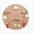 Golf-themed stud earring set displayed on a leather backing, featuring golf balls, visors, clubs, and rhinestone designs.