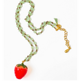 The Kids' Strawberry Charm Necklace displayed on a white background, showcasing its vibrant colors and design.
