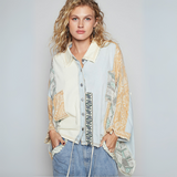 Front view of boho button-down kimono top in mixed yellow, green, and denim tones with floral print and oversized collar.