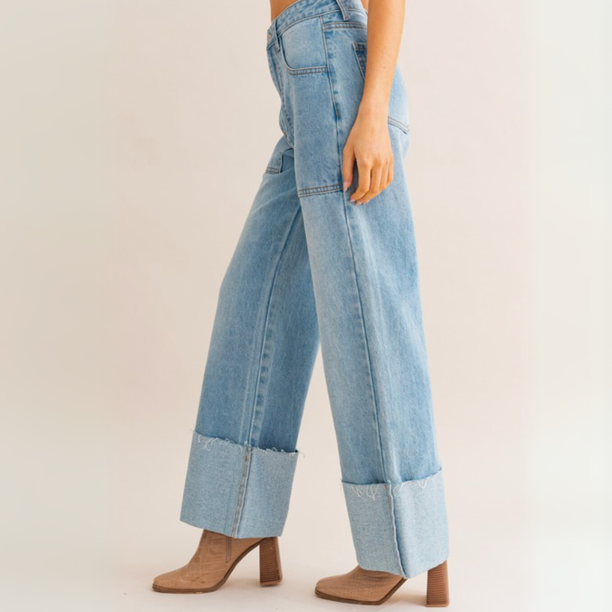 Side view of High Waist Wide Leg Cuffed Jeans showing cuff and pocket detail
