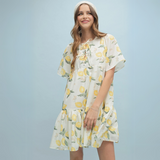 Full-Length View: Model wearing a vibrant lemon dress, perfect for summer and vacation styling.