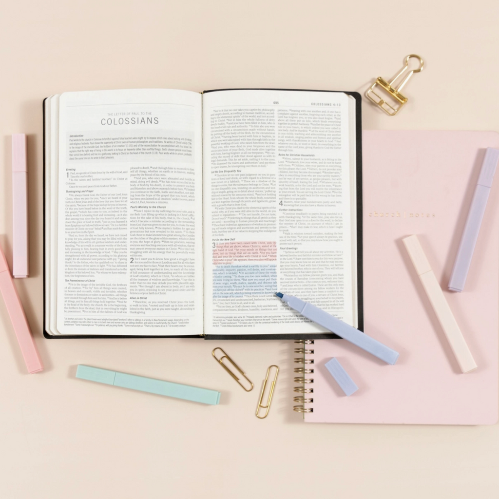 "Pastel Bible highlighters from Church Notes in use on an open Bible page with notebook and clips"

