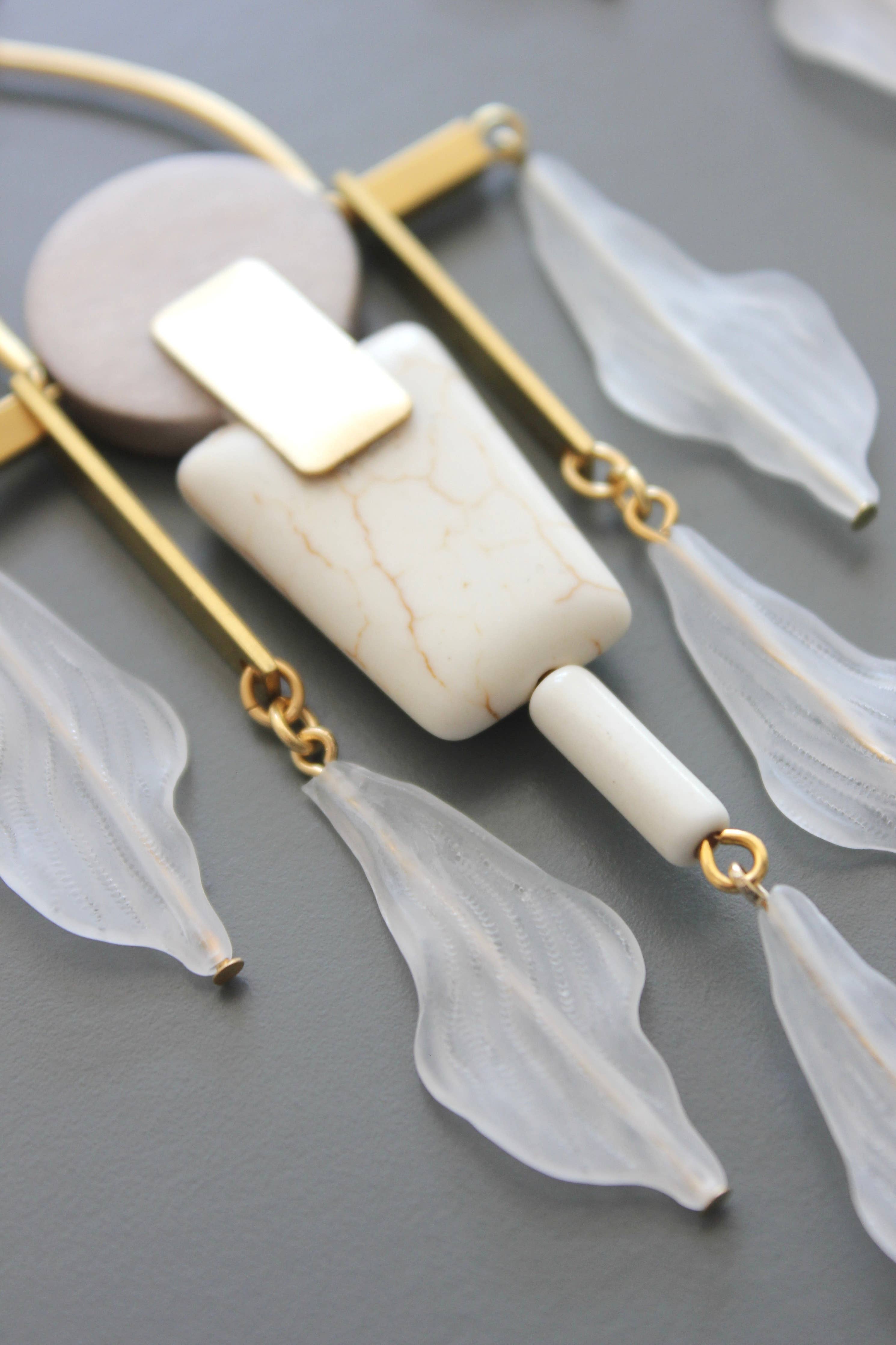 White and gray shoulder duster post earrings