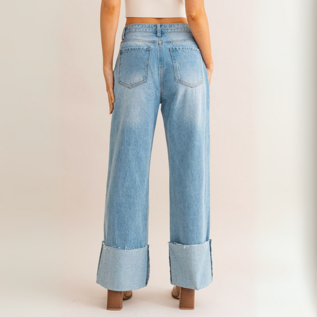 Back view of High Waist Wide Leg Cuffed Jeans with two back pockets
