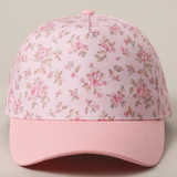 Close-up front view of pink floral baseball cap with pink brim
