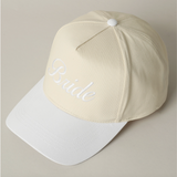 Cream and white embroidered Bride baseball cap, perfect for bachelorette parties, bridal showers, and wedding day photos.