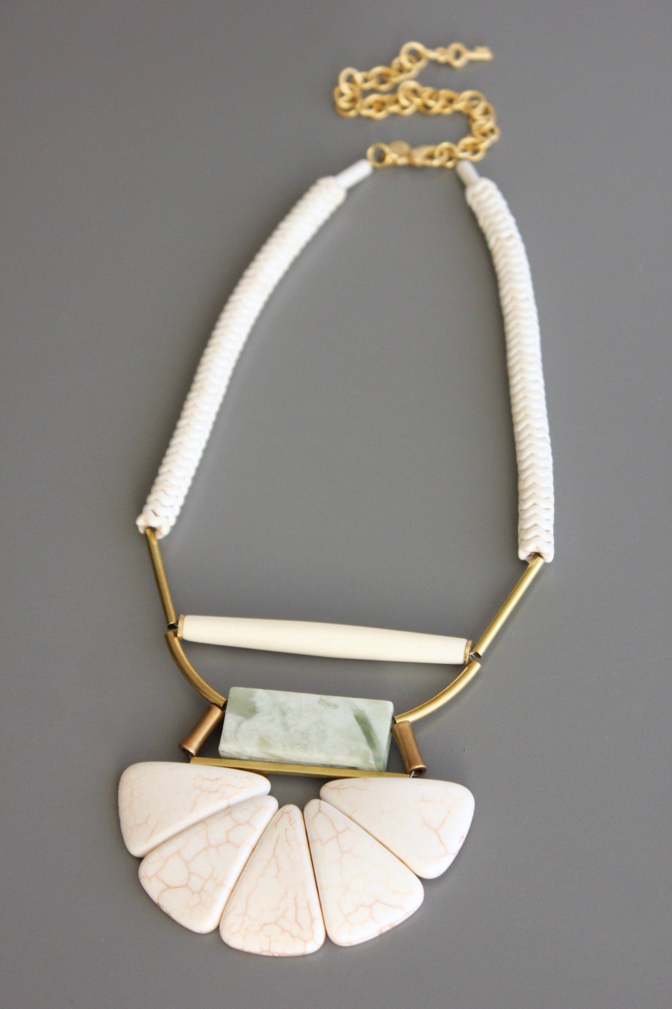 Magnesite, horn, serpentine, and brass necklace