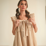 Close-up of V-neckline and fabric texture of En Merci caramel and white stripe midi dr