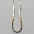 Gold hematite and white disc necklace