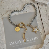 Star charm two tone silver and gold ombré pendant bracelet