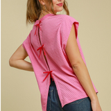 Back view of Bubble Pink Dolman Top with split-back and red bows.