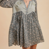 Front view of Floral Embroidered Babydoll Dress featuring a V-neckline with lace trim and a relaxed babydoll silhouette.