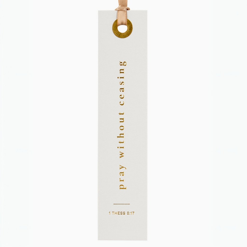 "Cream bookmark with gold scripture 'Pray without ceasing' - 1 Thessalonians 5:17."

