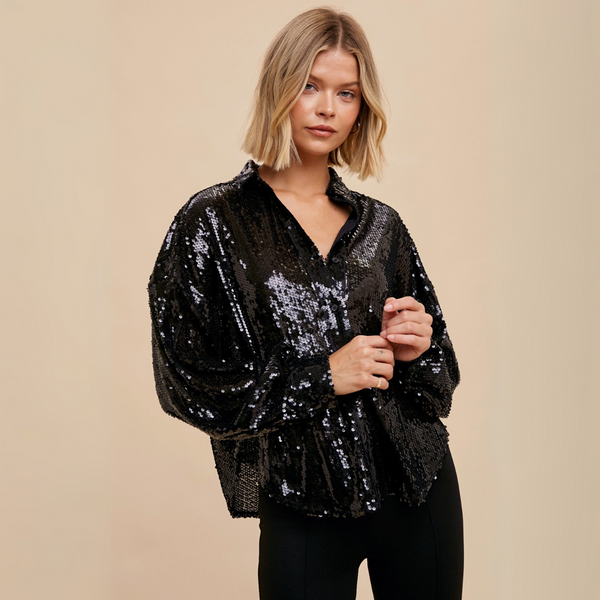 Front view of Sequin Button-Down Top styled with black pants, emphasizing its buttoned design and sparkling sequins.