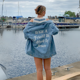 Back view of the denim jacket with "What a Friend We Have in Jesus" printed in bold lettering.

