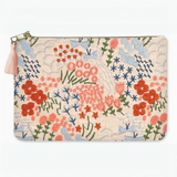 Front view of fabric pouch featuring hand-embroidered wildflowers in coral, red, and blue with a matching tassel zipper