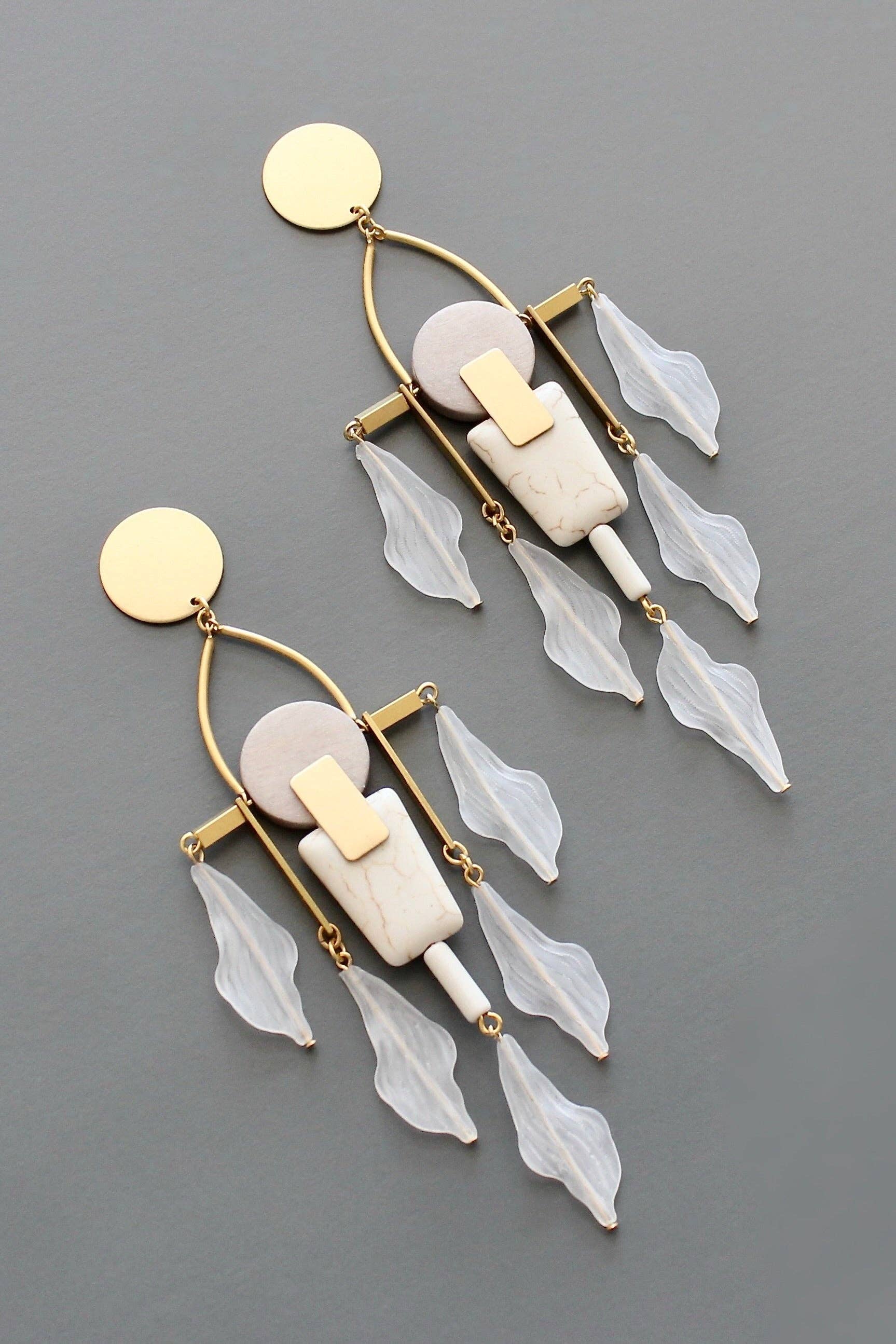White and gray shoulder duster post earrings