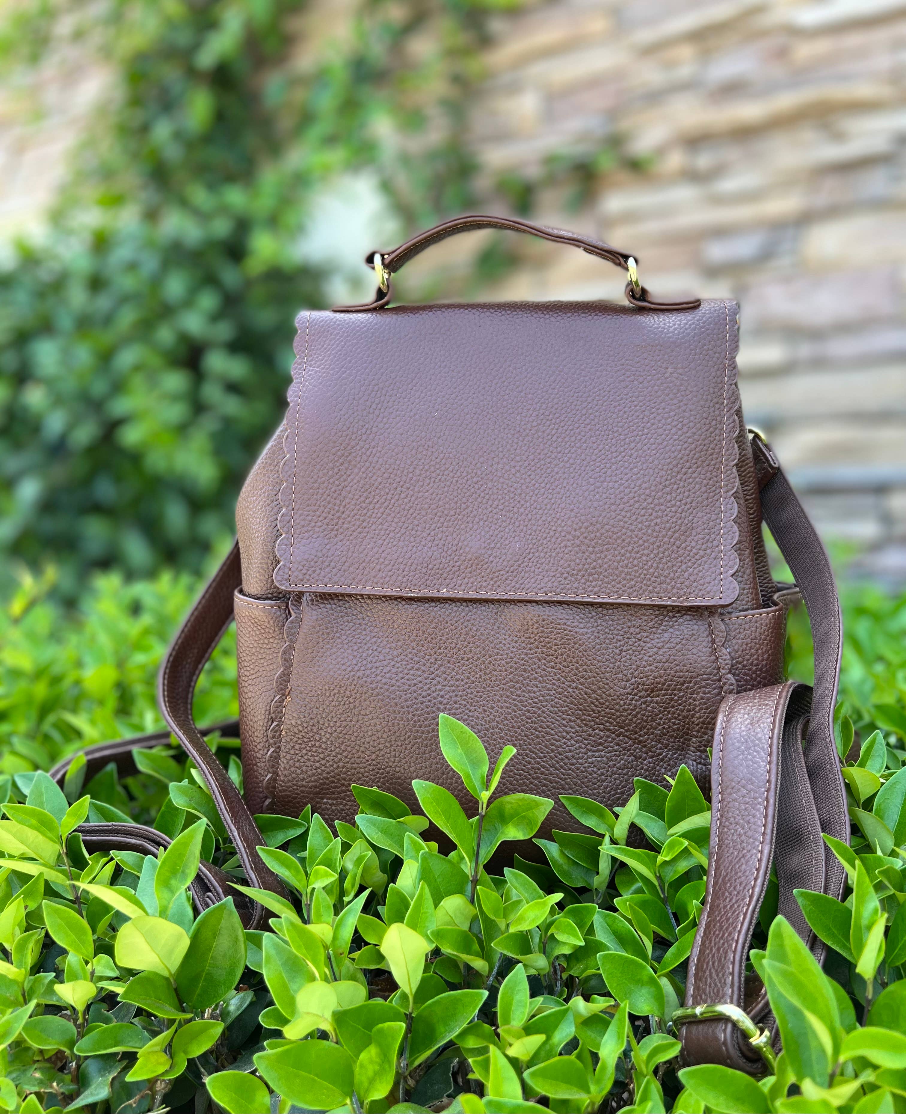 Top grain cowhide leather back pack crossbody shoulder bag