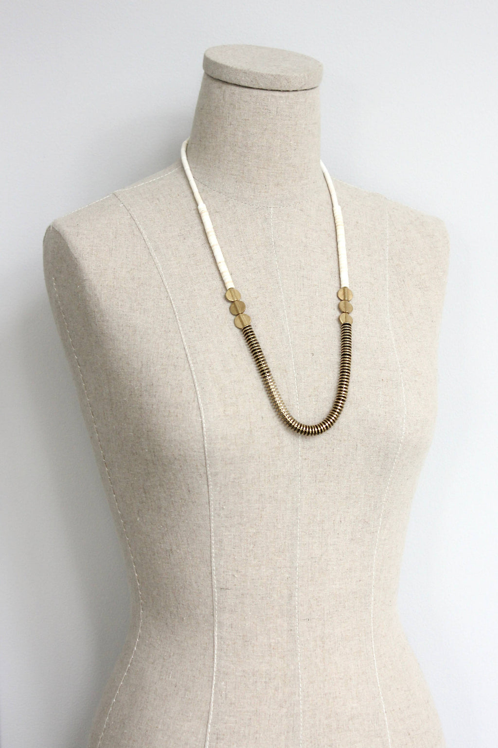 Gold hematite and white disc necklace