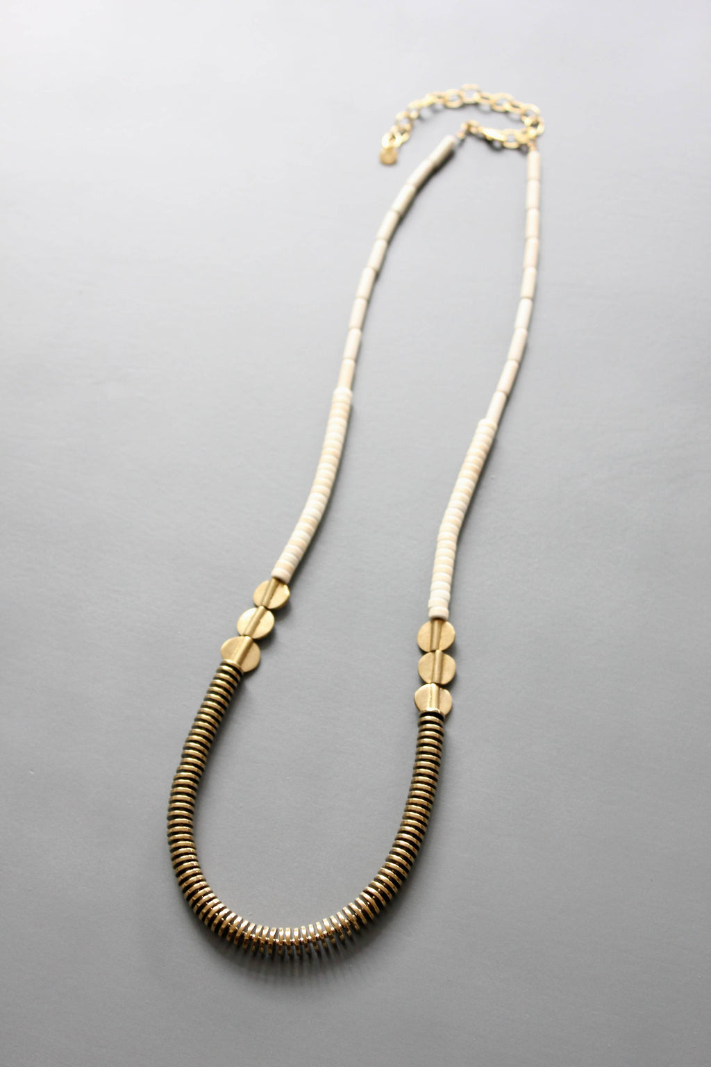 Gold hematite and white disc necklace
